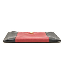 PRADA clutch in black and red grained leather