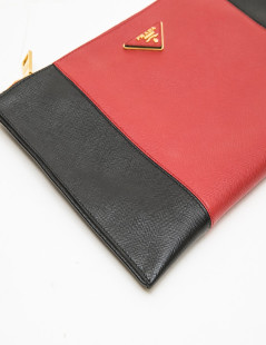 PRADA clutch in black and red grained leather