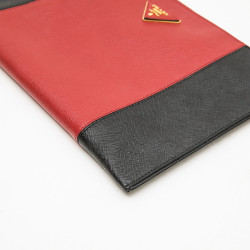 PRADA clutch in black and red grained leather