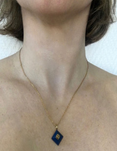 Collier HERMES en or avec pendentif Médor en lapis lazuli