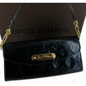 Pochette LOUIS VUITTON leather varnished blue Monogram "LV"