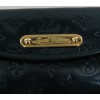 Pochette LOUIS VUITTON cuir vernis bleu monogramme "LV"