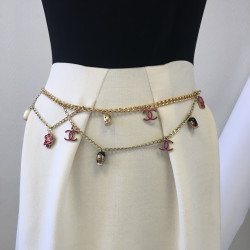 CHANEL "Paris-Shanghai"long necklace belt in gilt metal and charms