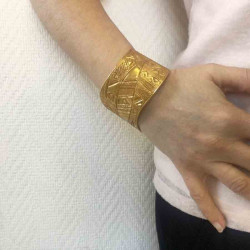 YSL YVES SAINT LAURENT Vintage cuff bracelet in matte gilded metal