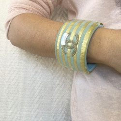 CHANEL cuff bracelet in skye blue resin and 5 stripes in gold leaf incrusted