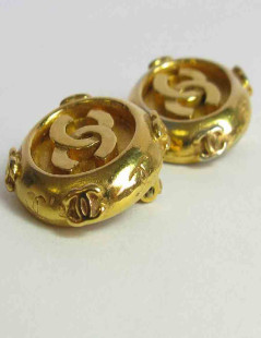 Boucles d'oreille clips CHANEL Vintage en métal doré