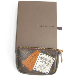 LOUIS VUITTON Wardrobe Trunks mini pouch in brown monogram canvas