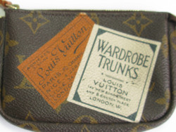 LOUIS VUITTON Wardrobe Trunks mini pouch in brown monogram canvas