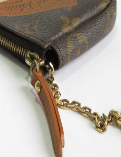 Mini pochette LOUIS VUITTON "Wardrobe Trunks" en toile monogram marron