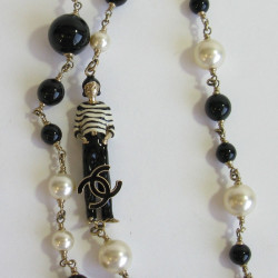 CHANEL multi row necklace with pearls, cc and Coco figurine