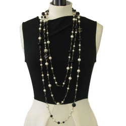 CHANEL multi row necklace with pearls, cc and Coco figurine