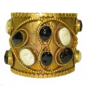 MARGUERITE de VALOIS Couture cuff bracelet in gilt metal and molten glass cabochons