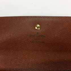 Portefeuille LOUIS VUITTON en toile monogram LV marron