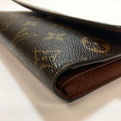 Portefeuille LOUIS VUITTON en toile monogram LV