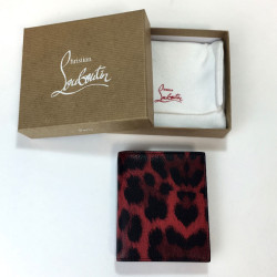 Portefeuille CHRISTIAN LOUBOUTIN en cuir rouge motif léopard