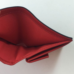 Portefeuille CHRISTIAN LOUBOUTIN en cuir rouge motif léopard