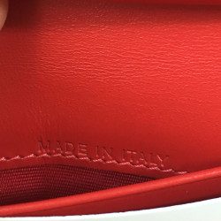 Portefeuille CHRISTIAN LOUBOUTIN en cuir rouge motif léopard