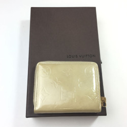 Porte-monnaie LOUIS VUITTON en cuir monogram beige verni