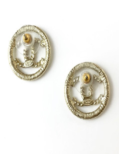 Boucles d'oreille clous CC CHANEL en métal doré