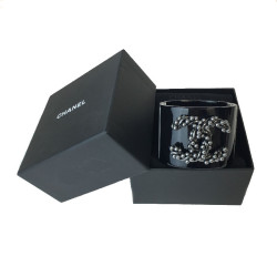 CHANEL cuff bracelet in black plexi and CC in gunmetal color