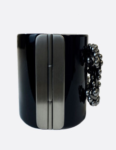 CHANEL cuff bracelet in black plexi and CC in gunmetal color