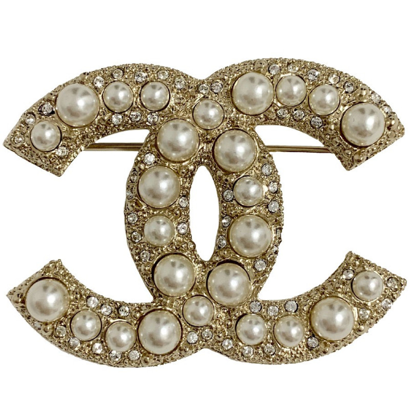 Broche CHANEL CC en perles nacrées et strass