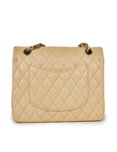 Sac Timeless CHANEL cuir lisse matelassé beige