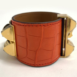 Manchette Médor HERMES crocodile orange métal dorée