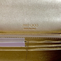 Pochette JIMMY CHOO lamé doré modèle MILLA