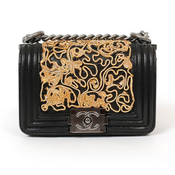 CHANEL mini Boy bag in black lambskin and golden lace