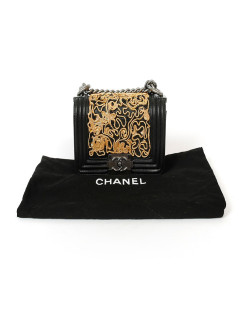 CHANEL mini Boy bag in black lambskin and golden lace