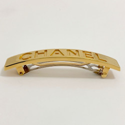 Barrette CHANEL dorée gravée C H A N E L