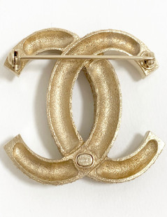 Broche CHANEL dorée et brilants