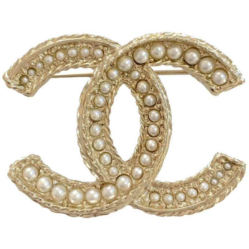 Broche CHANEL dorée et perles nacrées