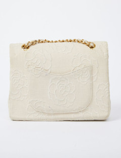 A NETTOYERSac motifs camélias CHANEL toile beige