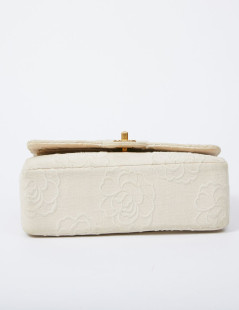 A NETTOYERSac motifs camélias CHANEL toile beige