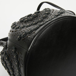 Sac seau ALAIA cuir noir perforé et fleurs 