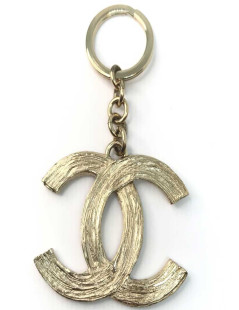 Porte-clefs CHANEL métal doré CC