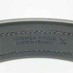 Bracelet vert HERMES en veau, toile et laiton