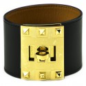 Bracelet Extrême HERMES cuir noir mat et accastillage doré